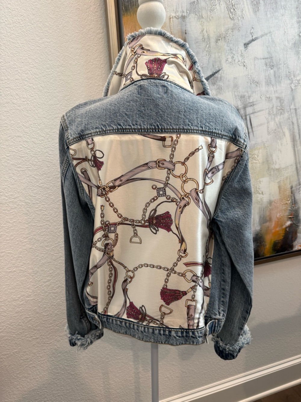 Women's Distressed Blue Denim Jacket with Cream Chain-Print Back